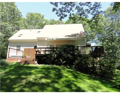 52 Montauk Road Charlestown, RI 02813 - Photo 12 of 16 Exterior Back. Nice retractable awning adds shade to the deck.