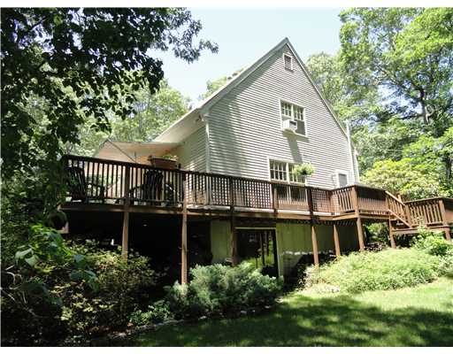 52 Montauk Road Charlestown, RI 02813 - Photo 9 of 16 Other. Deck wraps all around the side of the house.