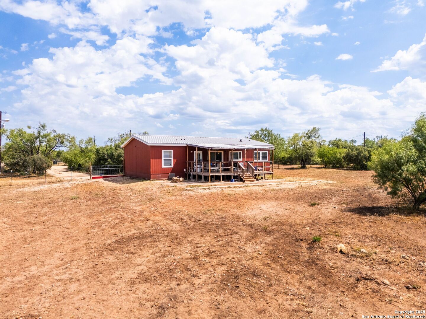 1979 County Road 651 Devine, TX 78016 - Photo 32 of 52 a view of outdoor space with city view