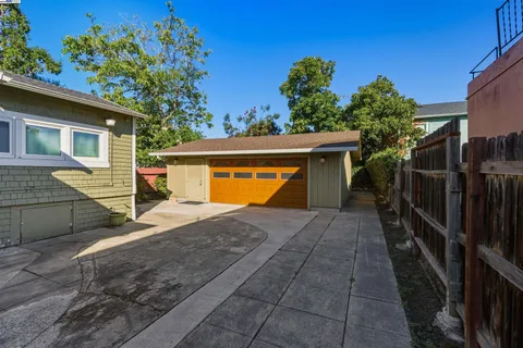 a view of a house with a garage and a garage