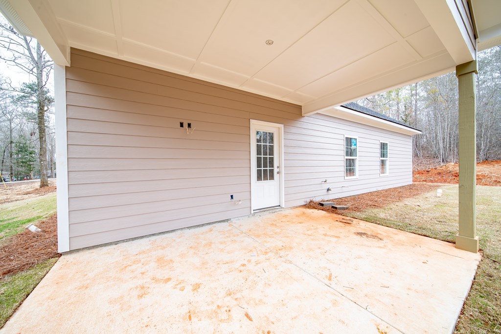 181 Twin Lakes Road Waverly Hall, GA 31831 - Photo 8 of 9 a view of a backyard of the house
