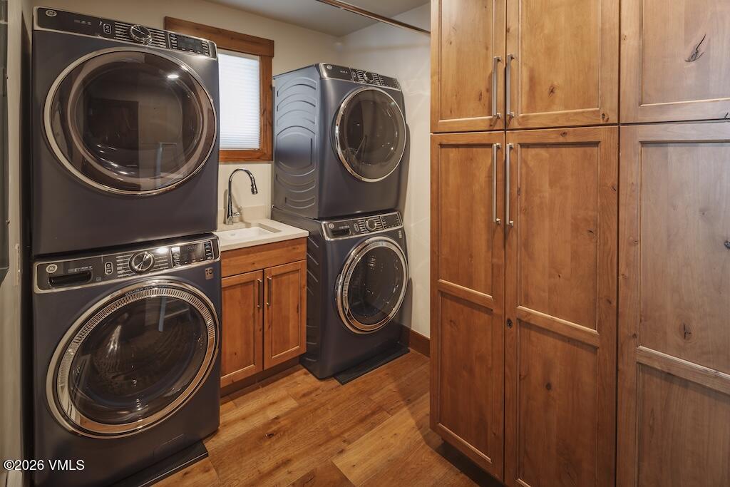 1670 Fall Ridge Road, Unit C11 Vail, CO 81657 - Photo 31 of 39 a utility room with dryer and washer