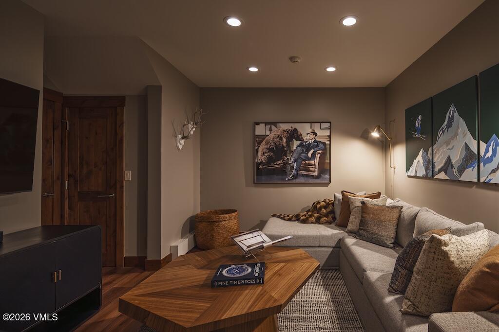 1670 Fall Ridge Road, Unit C11 Vail, CO 81657 - Photo 34 of 39 a living room with furniture and a painting on the wall