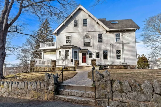 a front view of a large white building