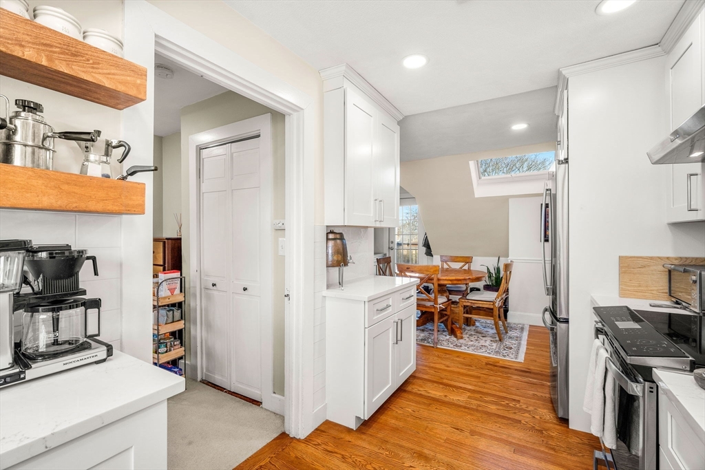 28 Columbus Avenue, Unit 3 Beverly, MA 01915 - Photo 23 of 40 a view of a living room kitchen and a wooden floor