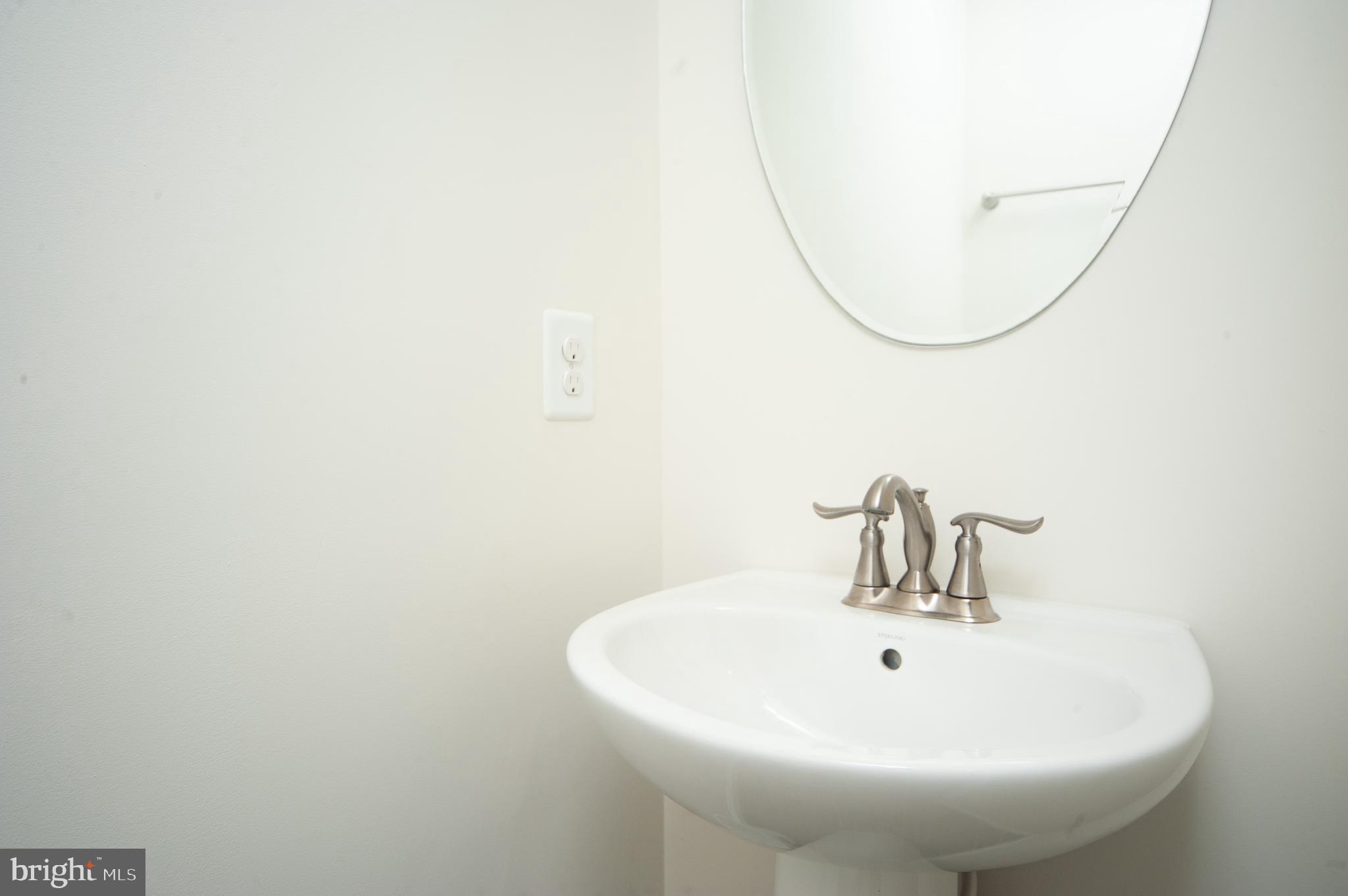 8005 Orchard Grove Road Odenton, MD 21113 - Photo 5 of 23 Half bath on first floor