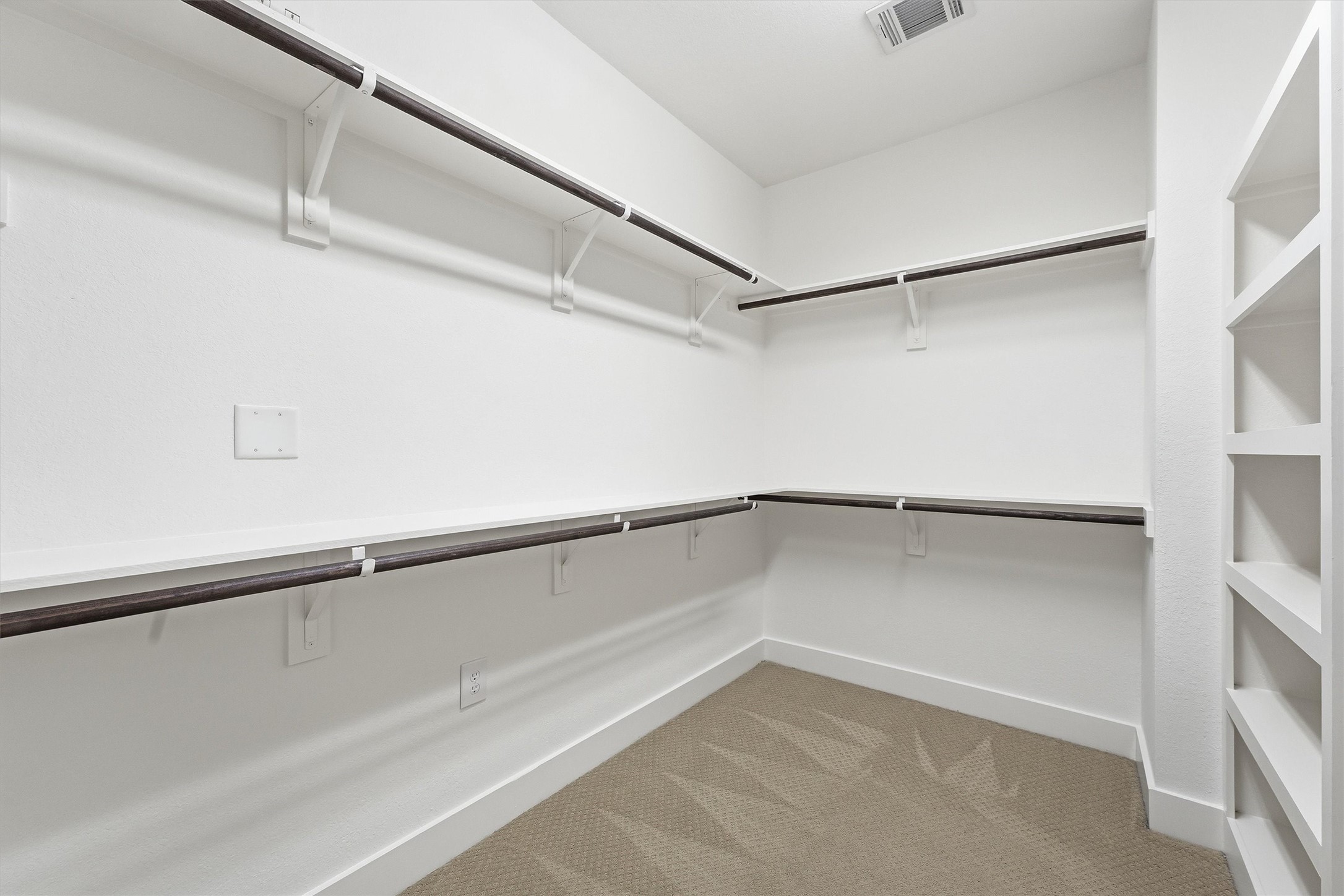 5326 Darling Street Houston, TX 77007 - Photo 22 of 31 The largest of the two primary closets, this one is acessed through the primary bathroom.