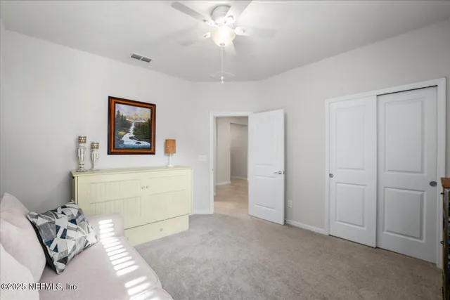 a view of green field with trees