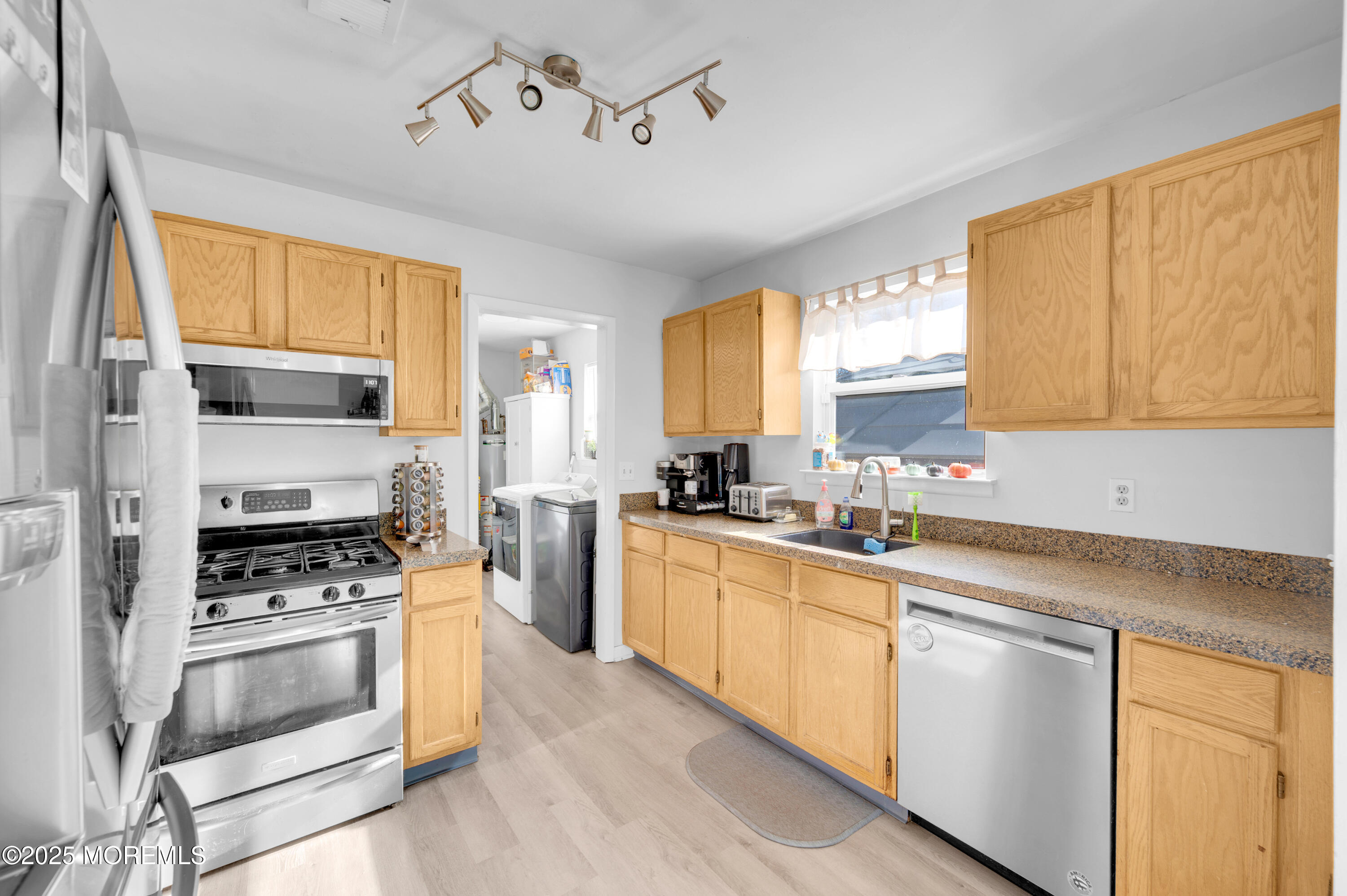 21 Shelli Terrace Barnegat, NJ 08005 - Photo 13 of 42 a kitchen with stainless steel appliances a stove sink and cabinets