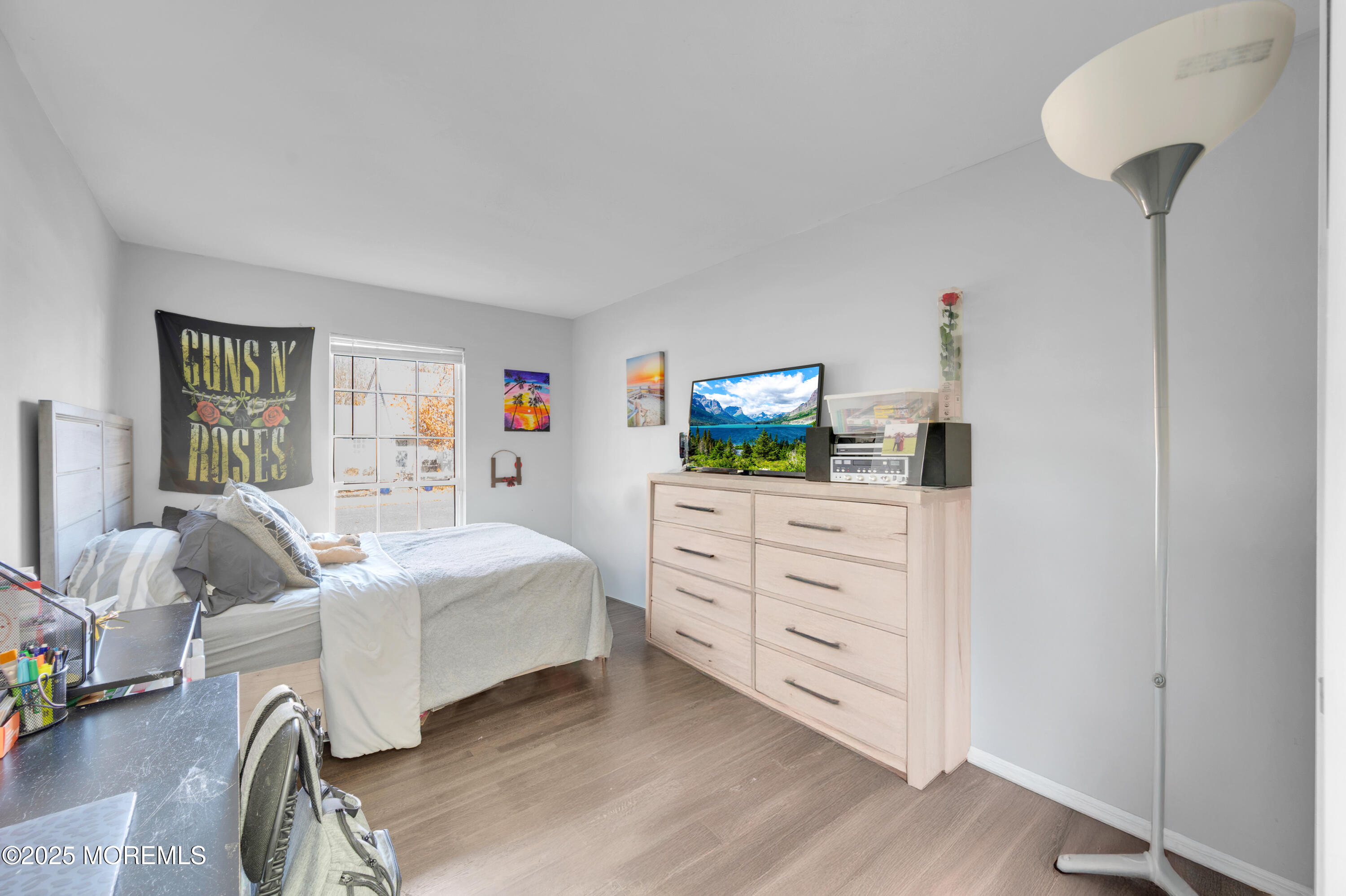 21 Shelli Terrace Barnegat, NJ 08005 - Photo 20 of 42 a bedroom with a bed and a flat tv screen on dresser