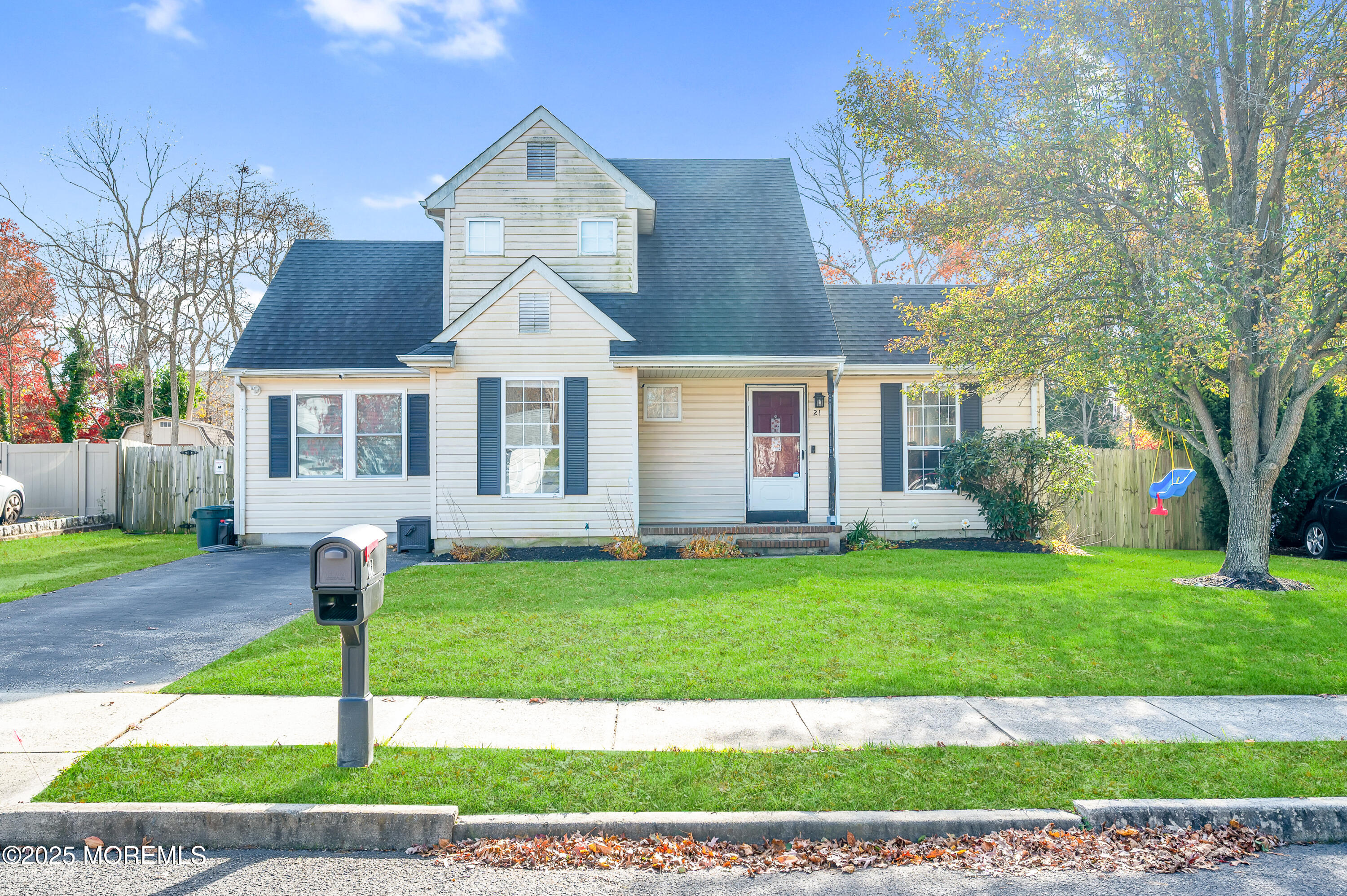21 Shelli Terrace Barnegat, NJ 08005 - Photo 41 of 42 a front view of a house with a yard and garage