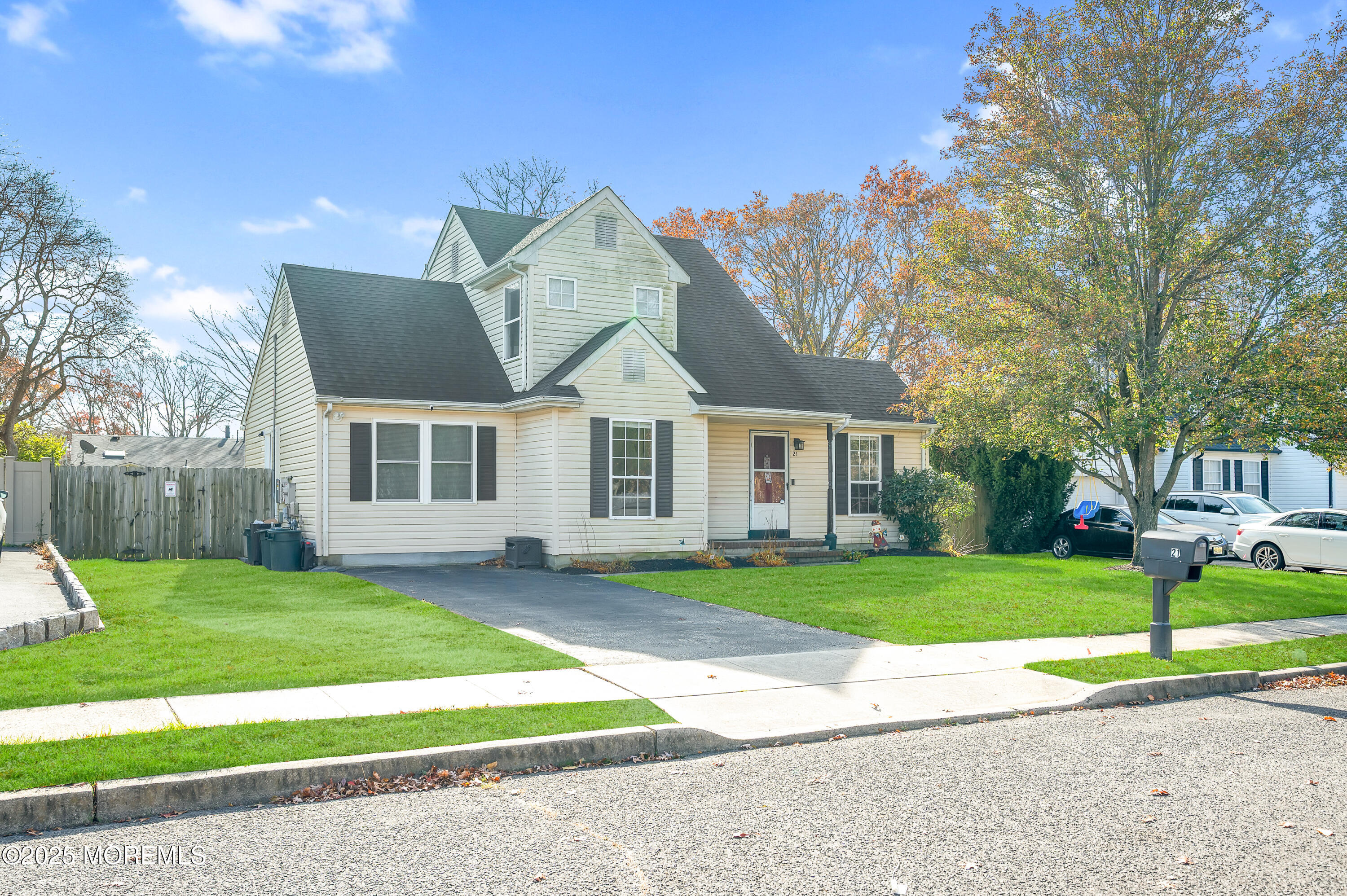 21 Shelli Terrace Barnegat, NJ 08005 - Photo 42 of 42 a front view of a house with a yard and garage