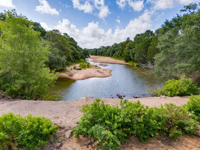 a view of swimming pool with yard