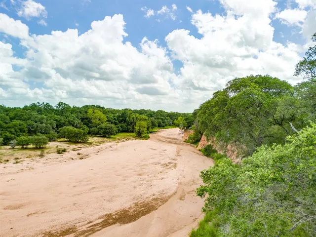 a view of a lake with a outdoor space