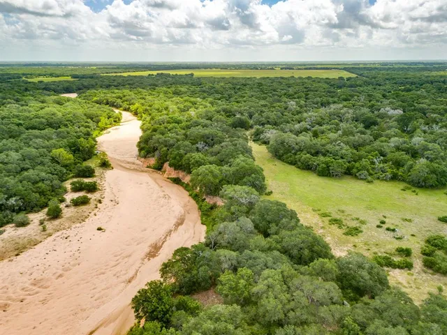 a view of a lake with a city