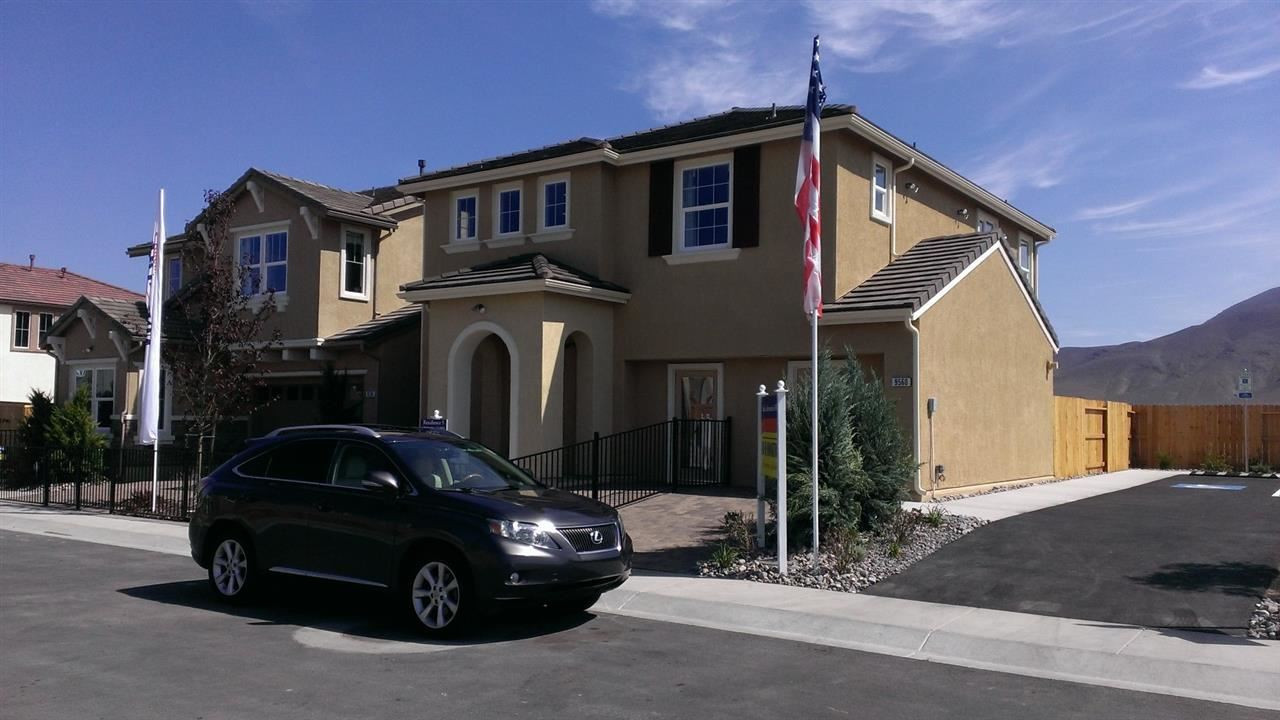 a car parked in front of a house