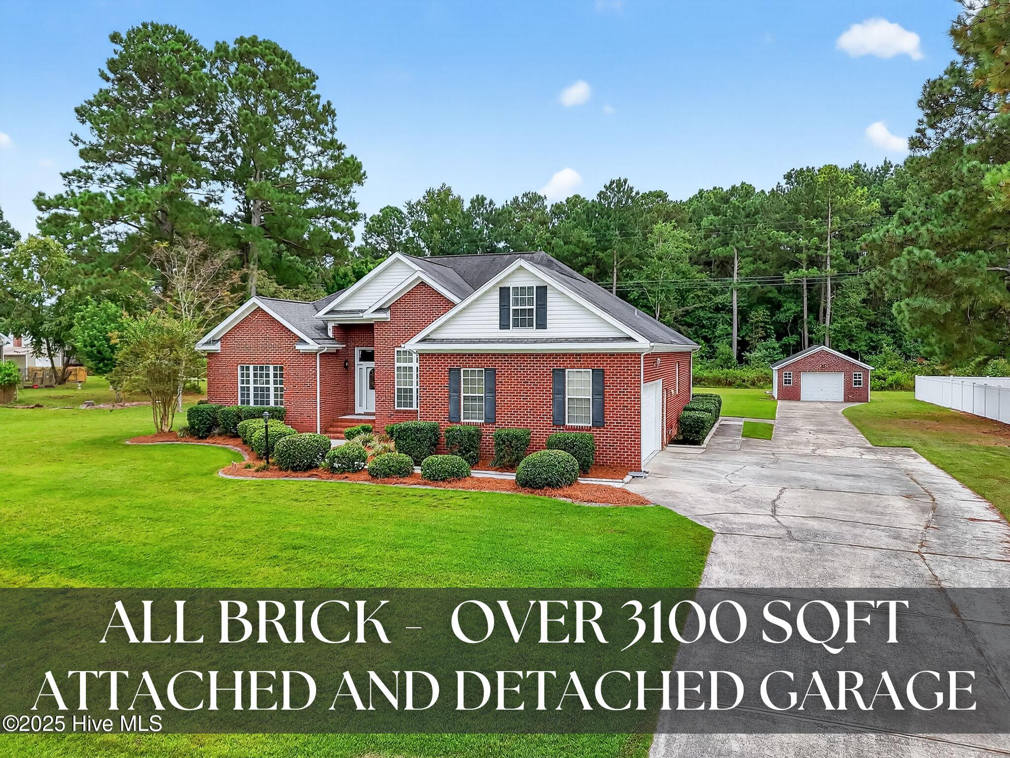 107 W Raintree Lane A Aerial View Of Home and Detached Garage