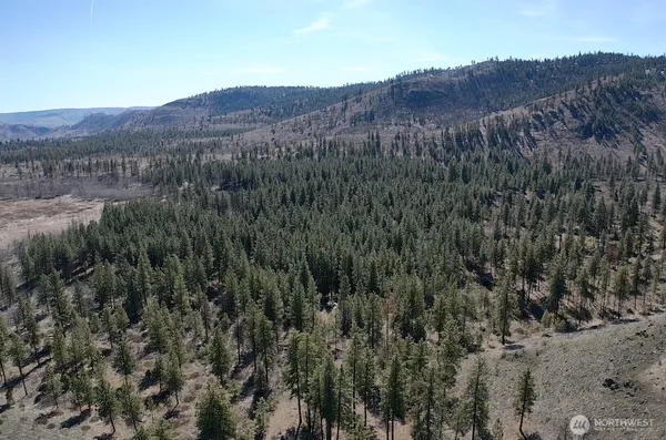 a view of mountains and valleys