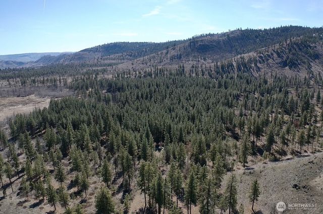 a view of mountains and valleys