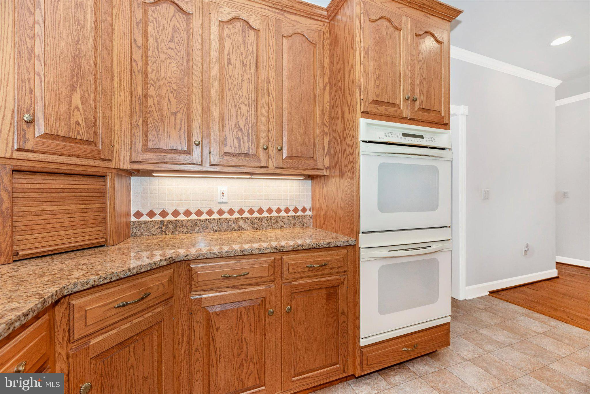 20405 Gap Court Rohrersville, MD 21779 - Photo 19 of 51 Warm oak cabinetry meets modern design.