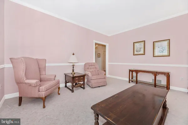 a bed room with a bed and a lamp