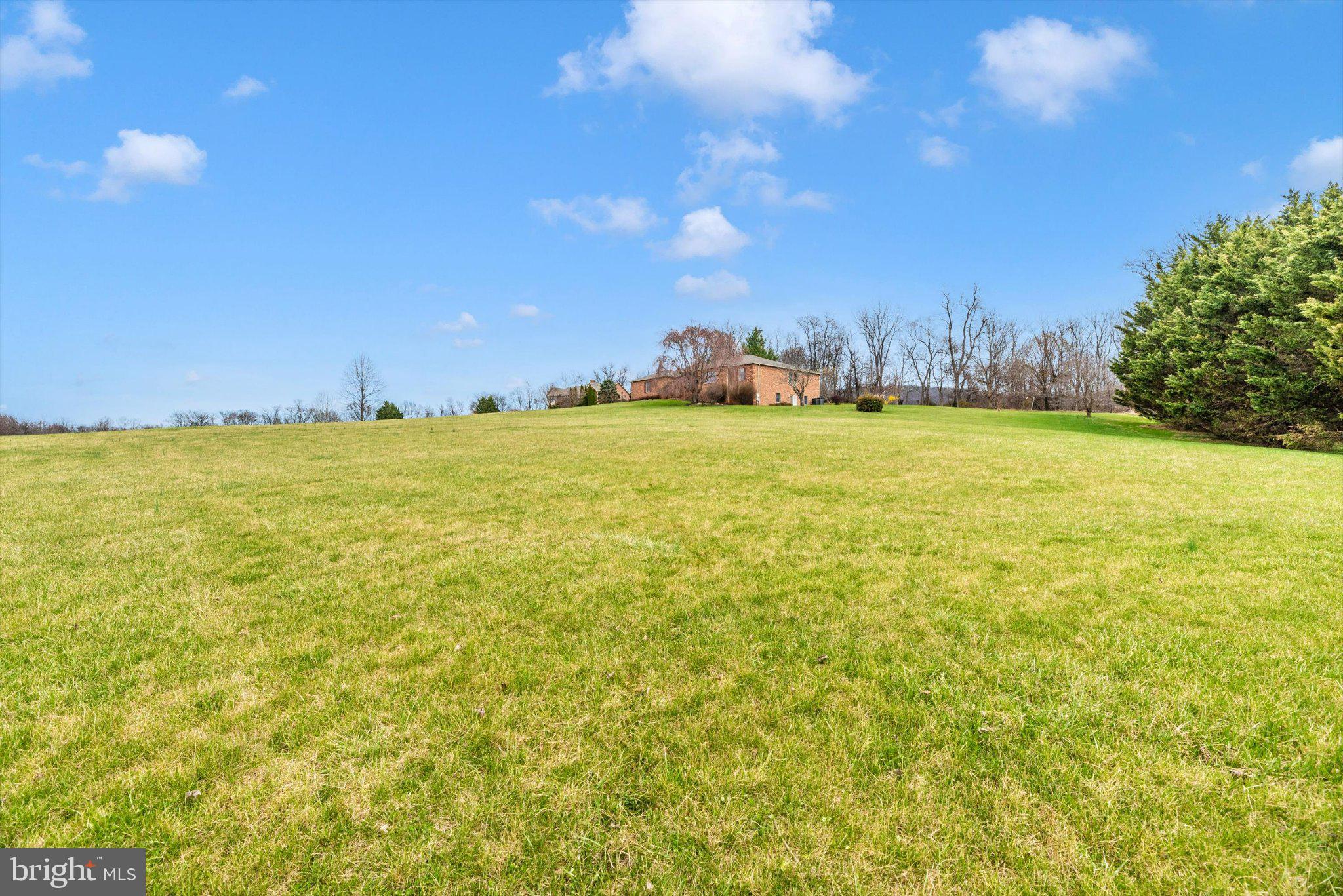 20405 Gap Court Rohrersville, MD 21779 - Photo 38 of 51 Expansive green landscape under blue skies.