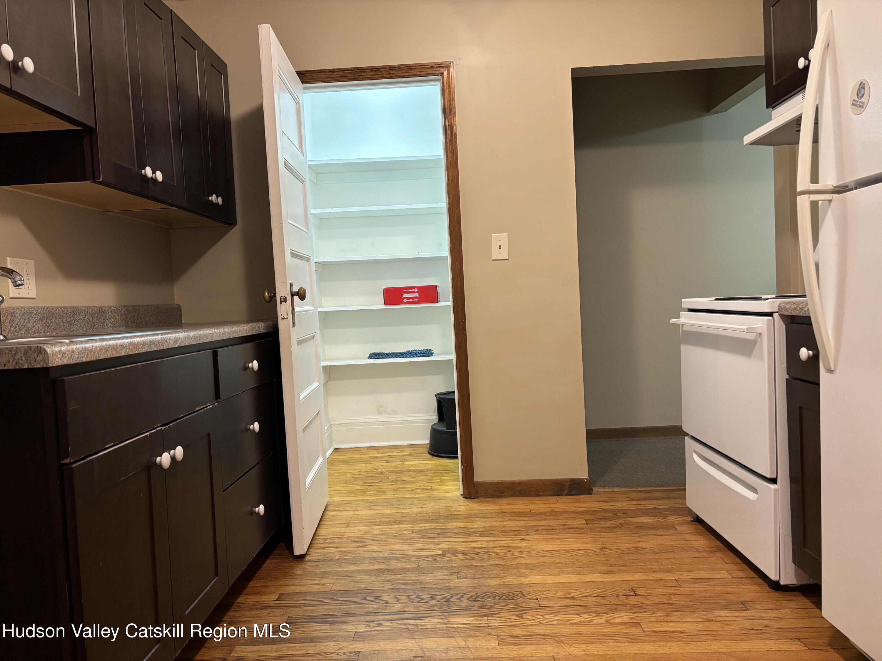 261 Fair Street, Unit B Kingston, NY 12401 - Photo 13 of 18 a view of empty room with wooden floor