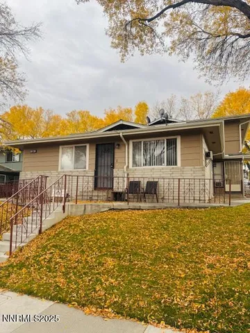 a front view of a house with swimming pool