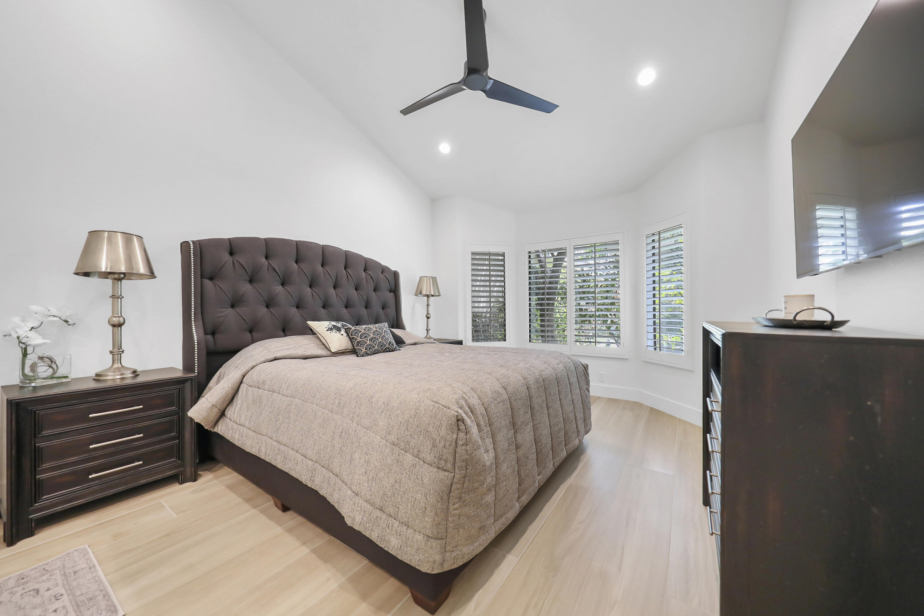 79754 Arnold Palmer La Quinta, CA 92253 - Photo 19 of 38 a bedroom with a bed and a window