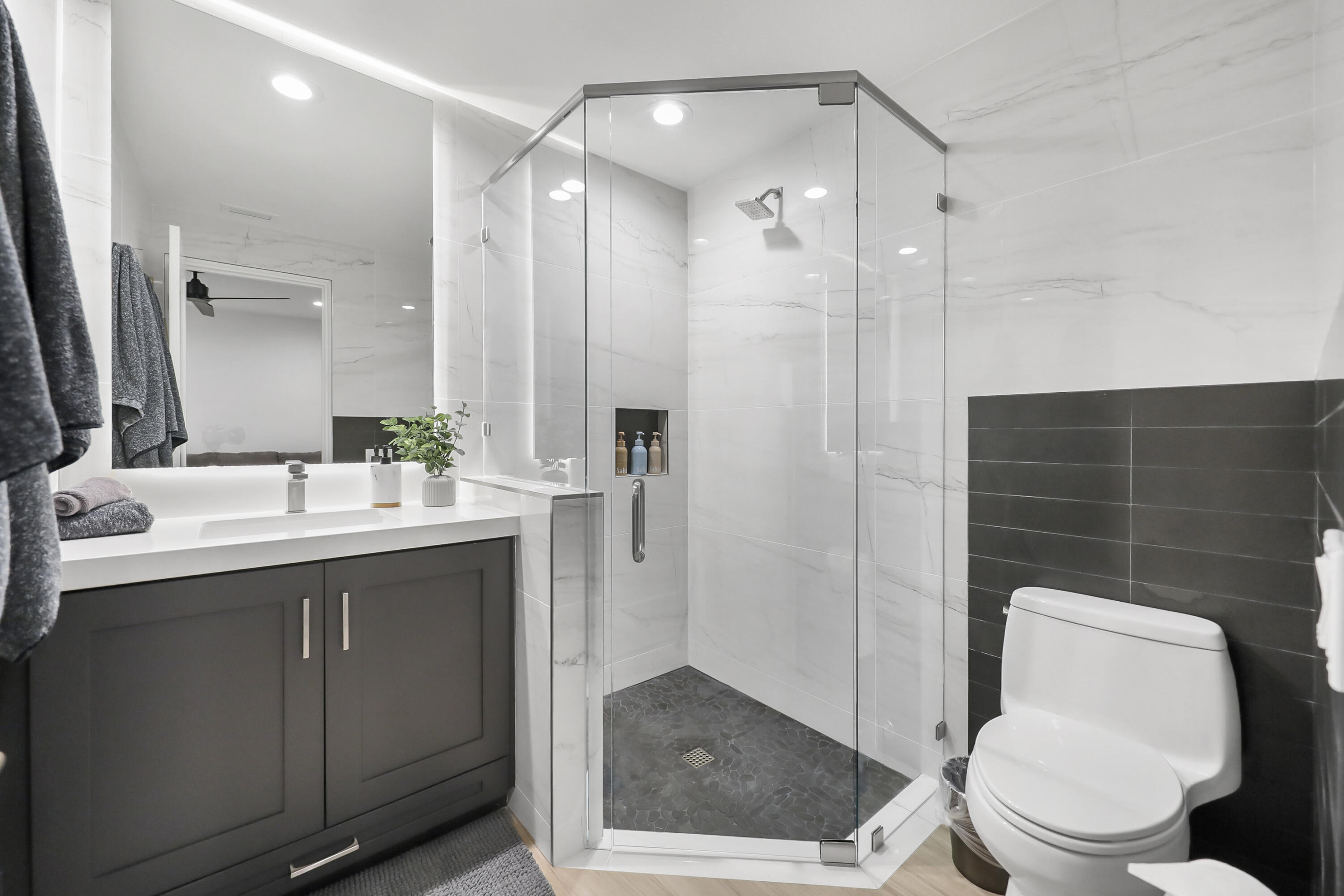 79754 Arnold Palmer La Quinta, CA 92253 - Photo 24 of 38 a bathroom with a sink a toilet and shower