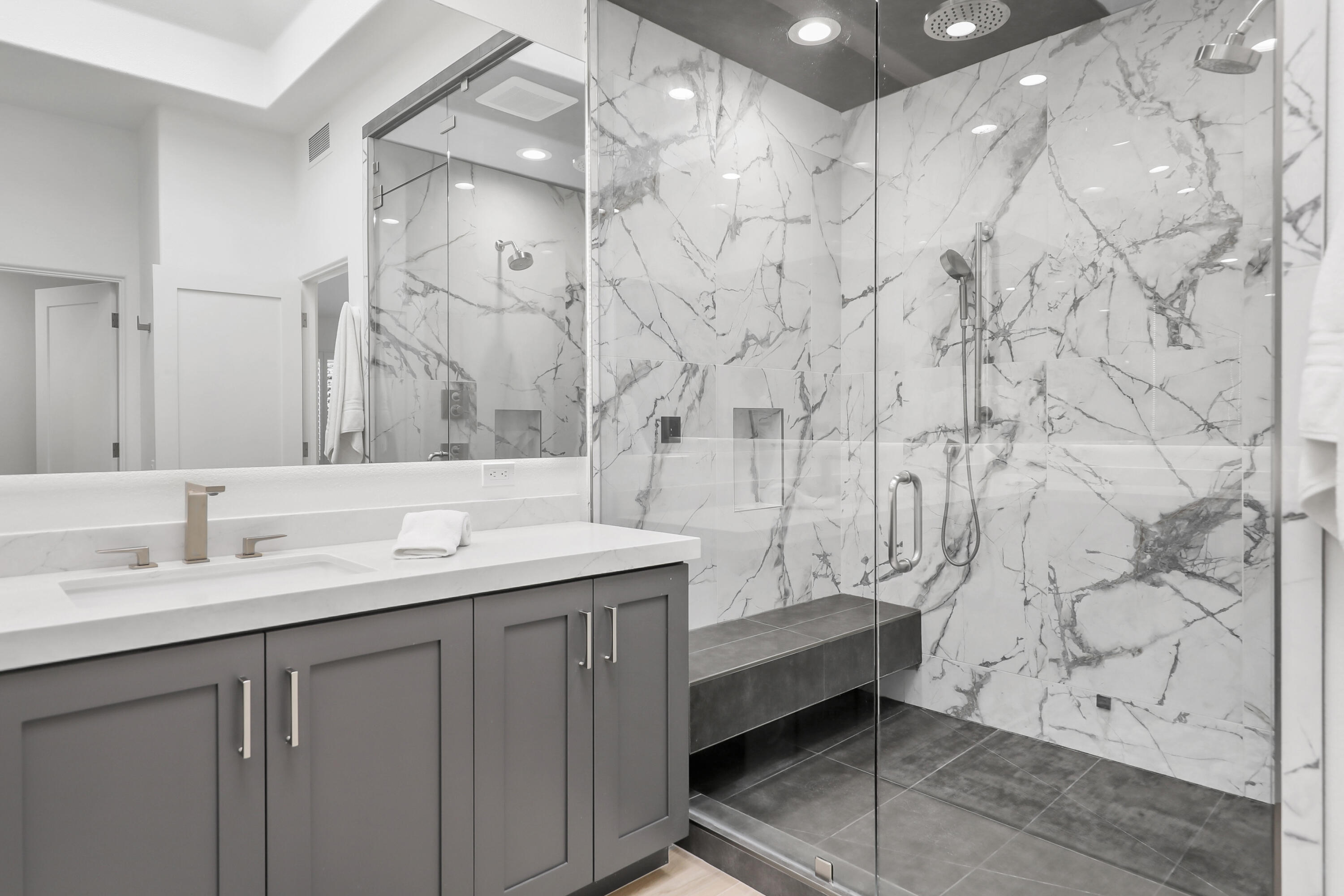 79754 Arnold Palmer La Quinta, CA 92253 - Photo 28 of 38 a bathroom with a sink and a mirror