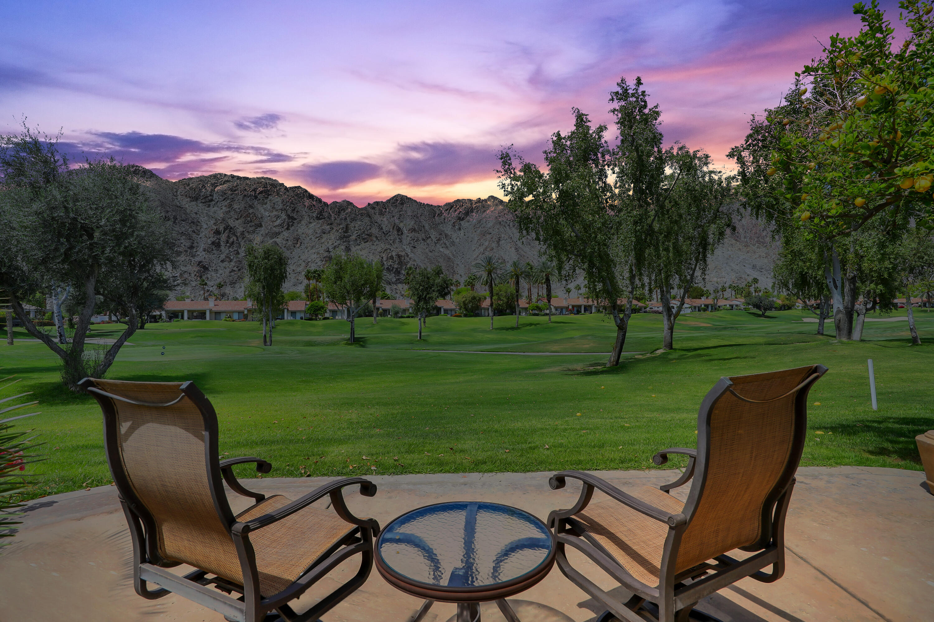 79754 Arnold Palmer La Quinta, CA 92253 - Photo 32 of 38 a view of a two chairs in a big yard