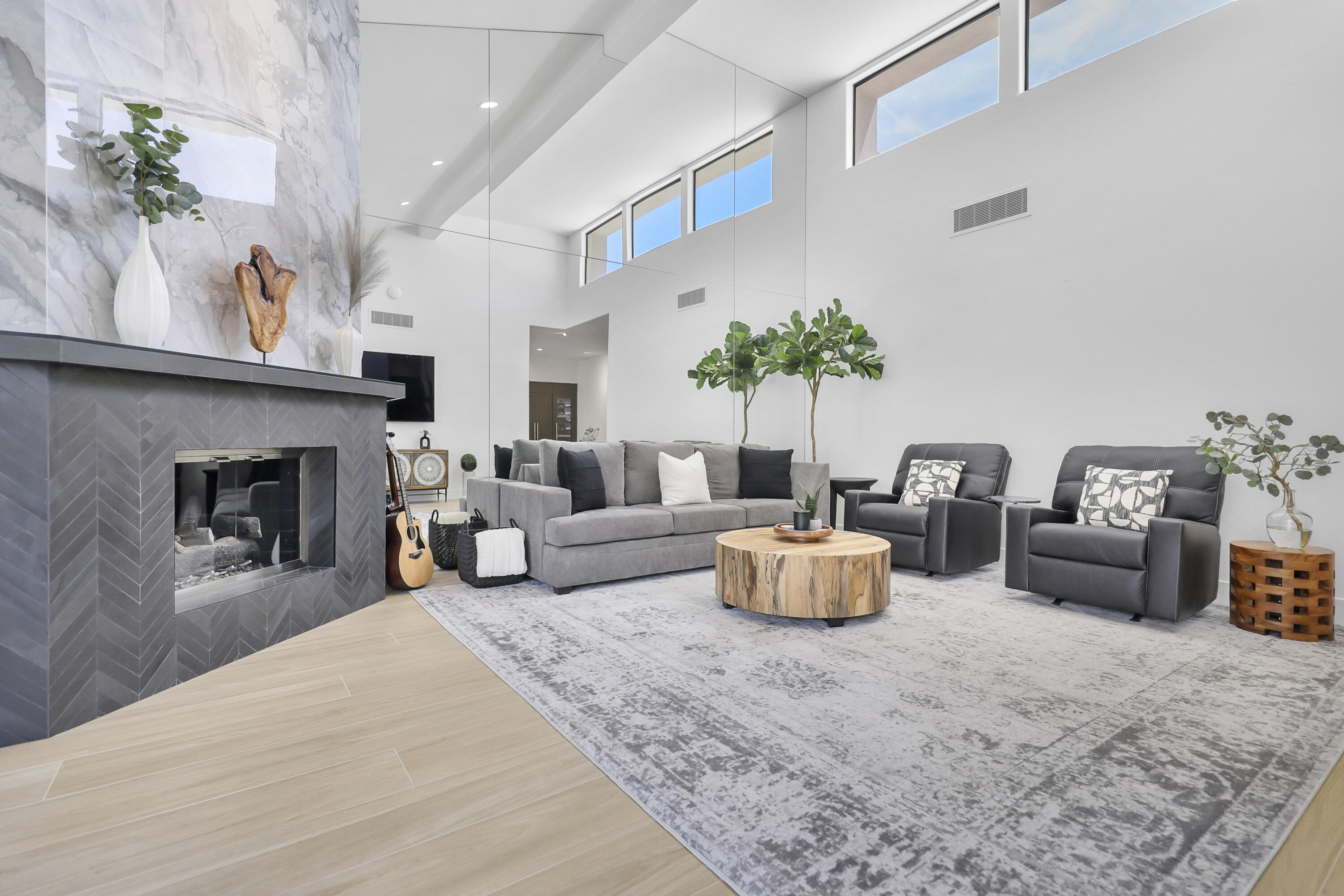 79754 Arnold Palmer La Quinta, CA 92253 - Photo 7 of 38 a living room with furniture and a fireplace