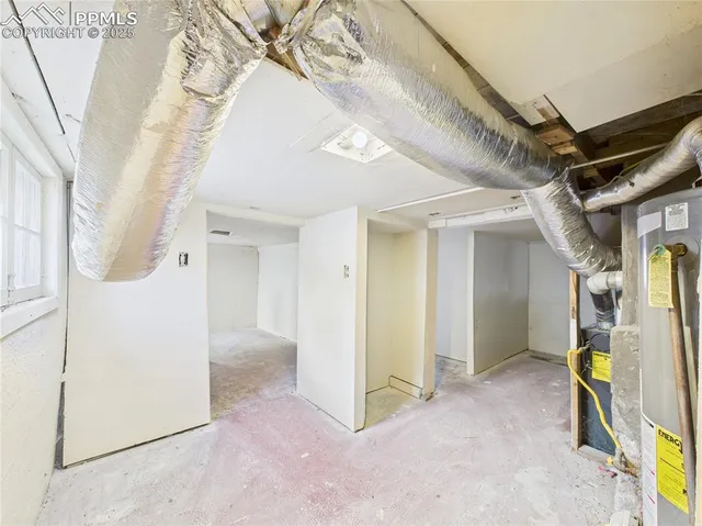 a view of a hallway with staircase