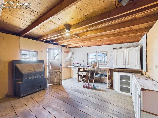 a view of a kitchen with dining area