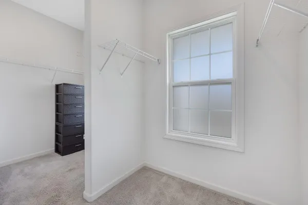 a bathroom with a sink a mirror and vanity