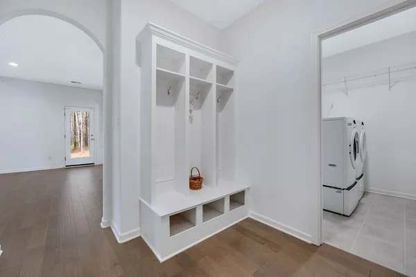 a view of a hallway with stairs