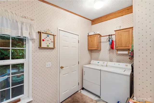 a bathroom with a sink mirror and toilet