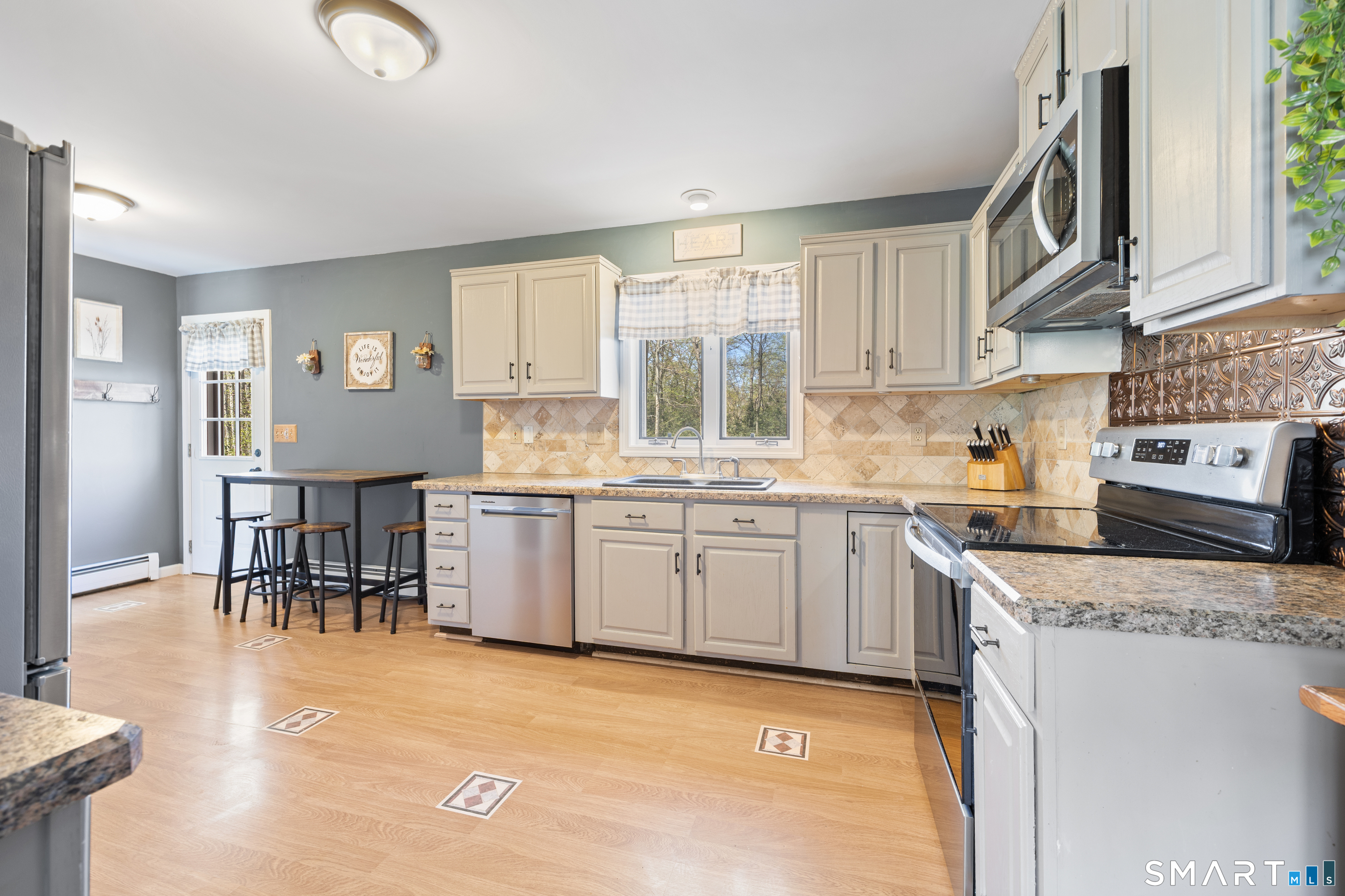 16 Stephen Court Prospect, CT 06712 - Photo 11 of 39 a kitchen with a sink cabinets and window