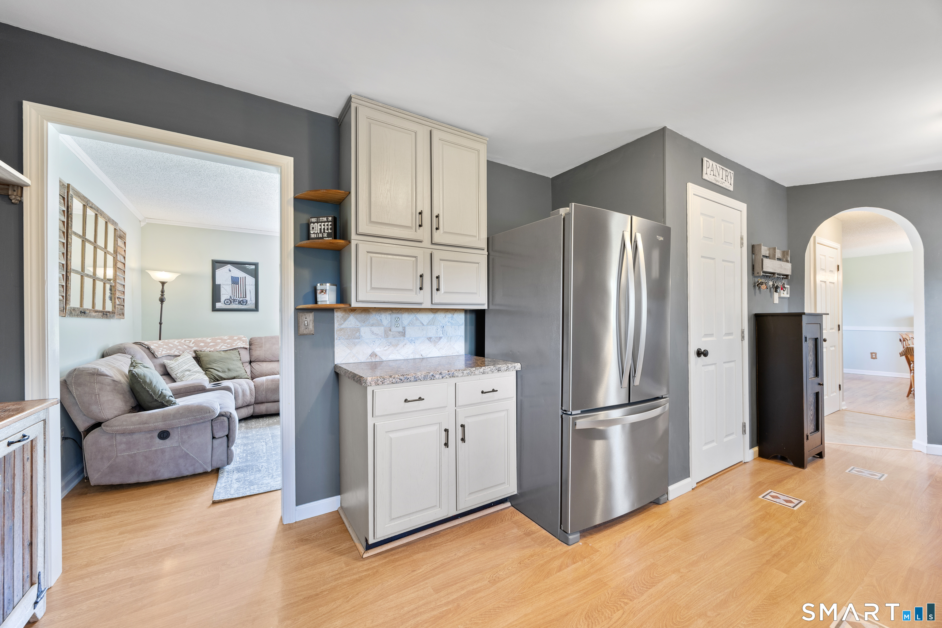 16 Stephen Court Prospect, CT 06712 - Photo 13 of 39 a kitchen with stainless steel appliances granite countertop a refrigerator and a stove top oven