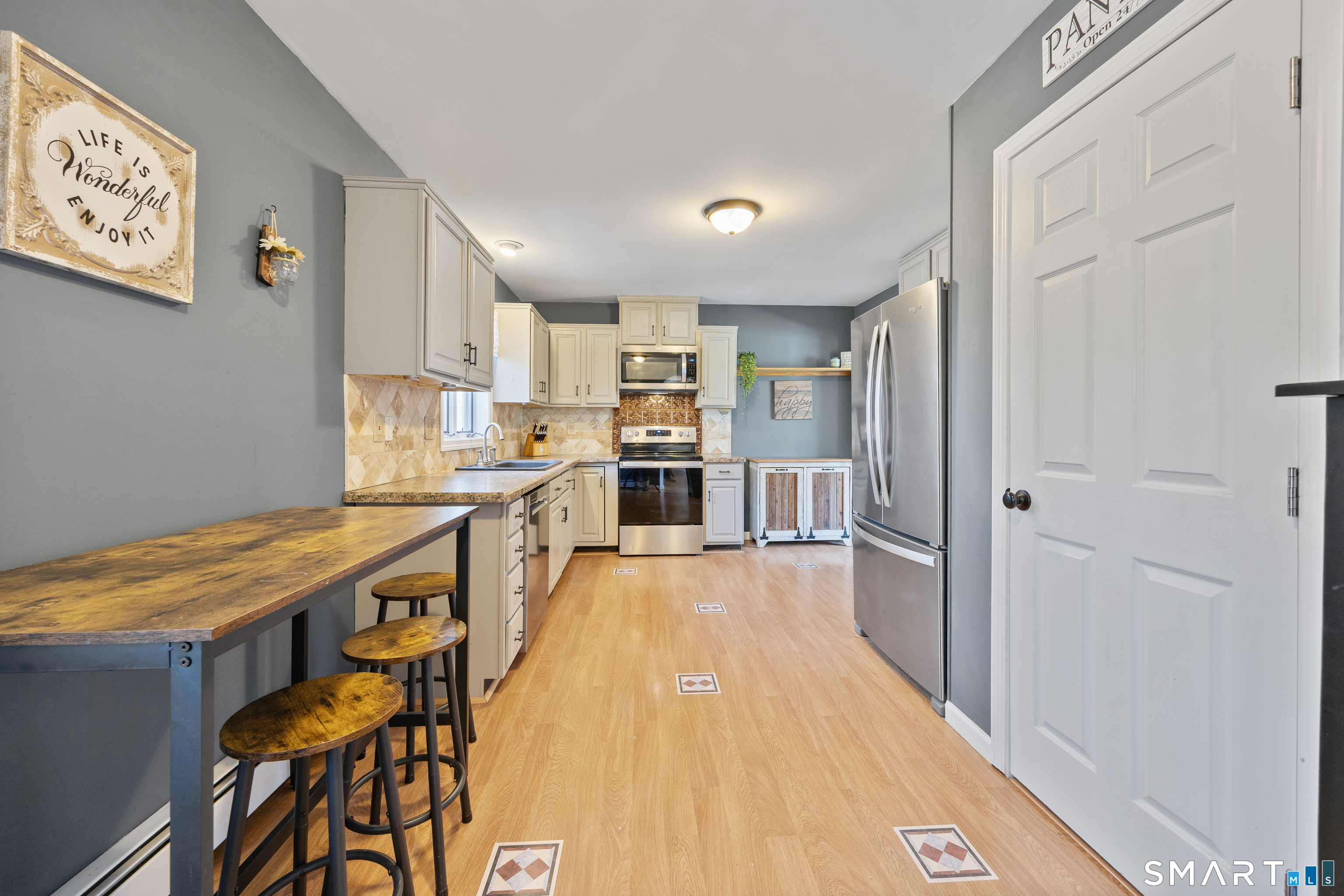 16 Stephen Court Prospect, CT 06712 - Photo 14 of 39 a kitchen with stainless steel appliances granite countertop a refrigerator and a sink