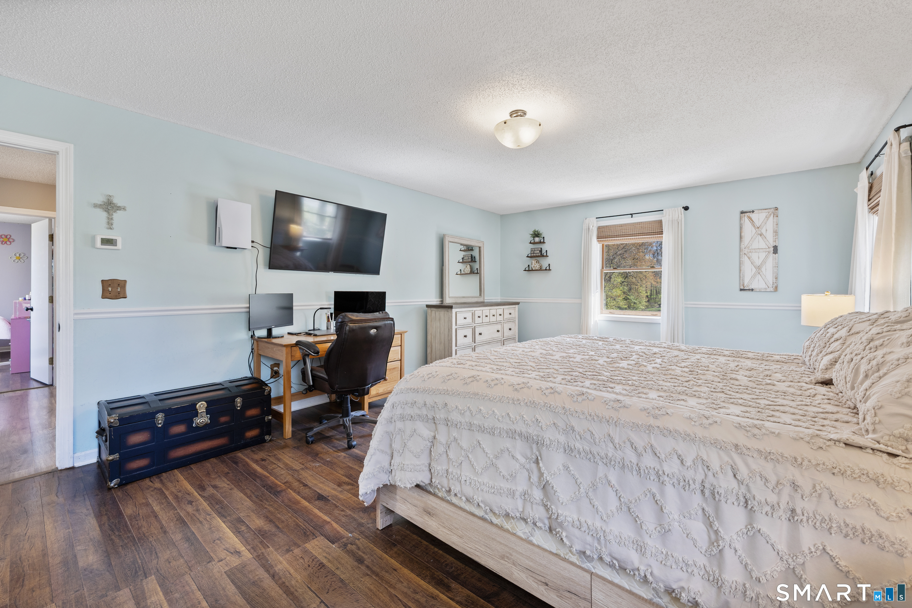 16 Stephen Court Prospect, CT 06712 - Photo 18 of 39 a bedroom with a bed and wooden floor