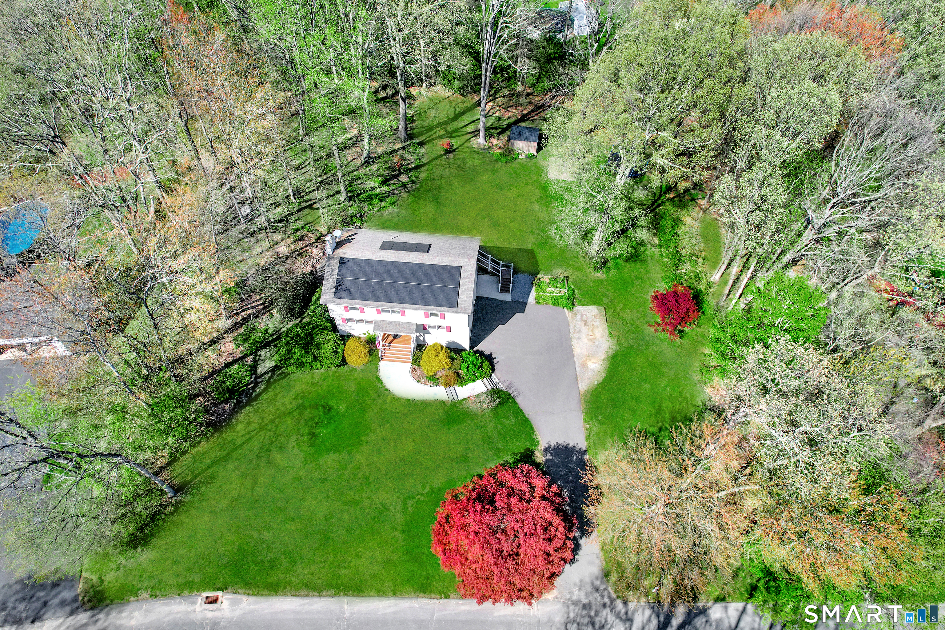 16 Stephen Court Prospect, CT 06712 - Photo 2 of 39 a view of a small yard with flower plants