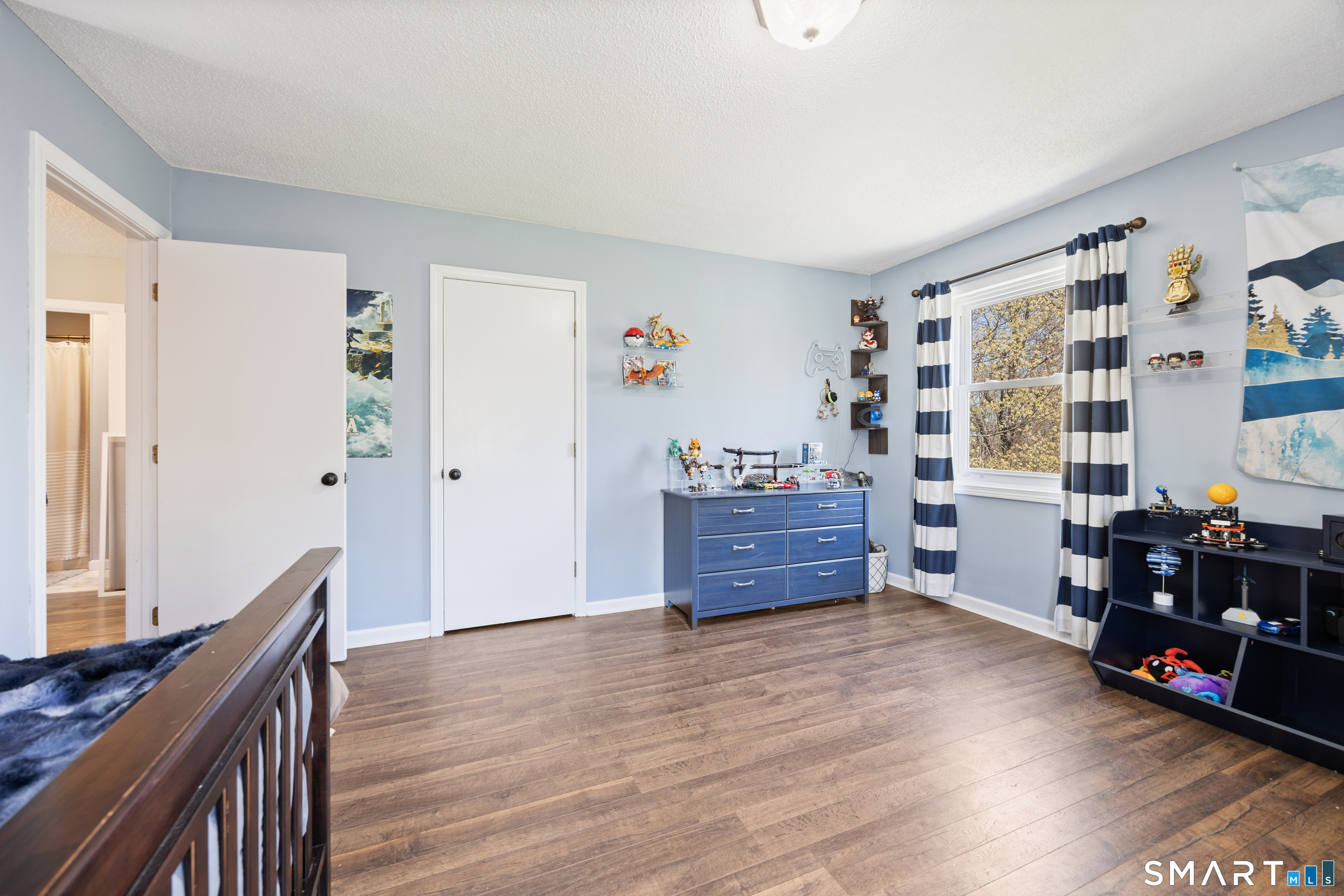 16 Stephen Court Prospect, CT 06712 - Photo 25 of 39 a bedroom with furniture and wooden floor