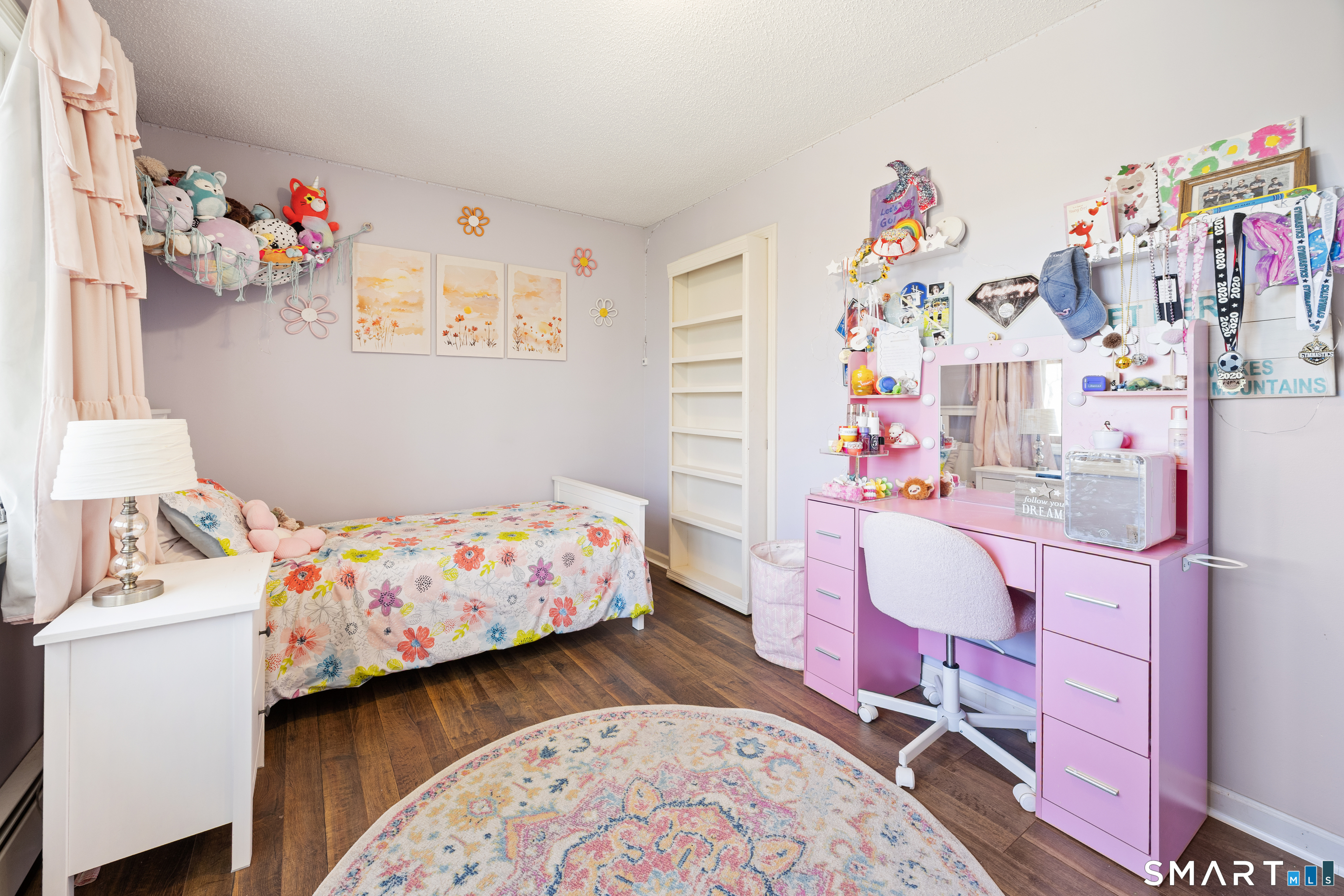 16 Stephen Court Prospect, CT 06712 - Photo 26 of 39 a bedroom with baby bed toys and wooden floor