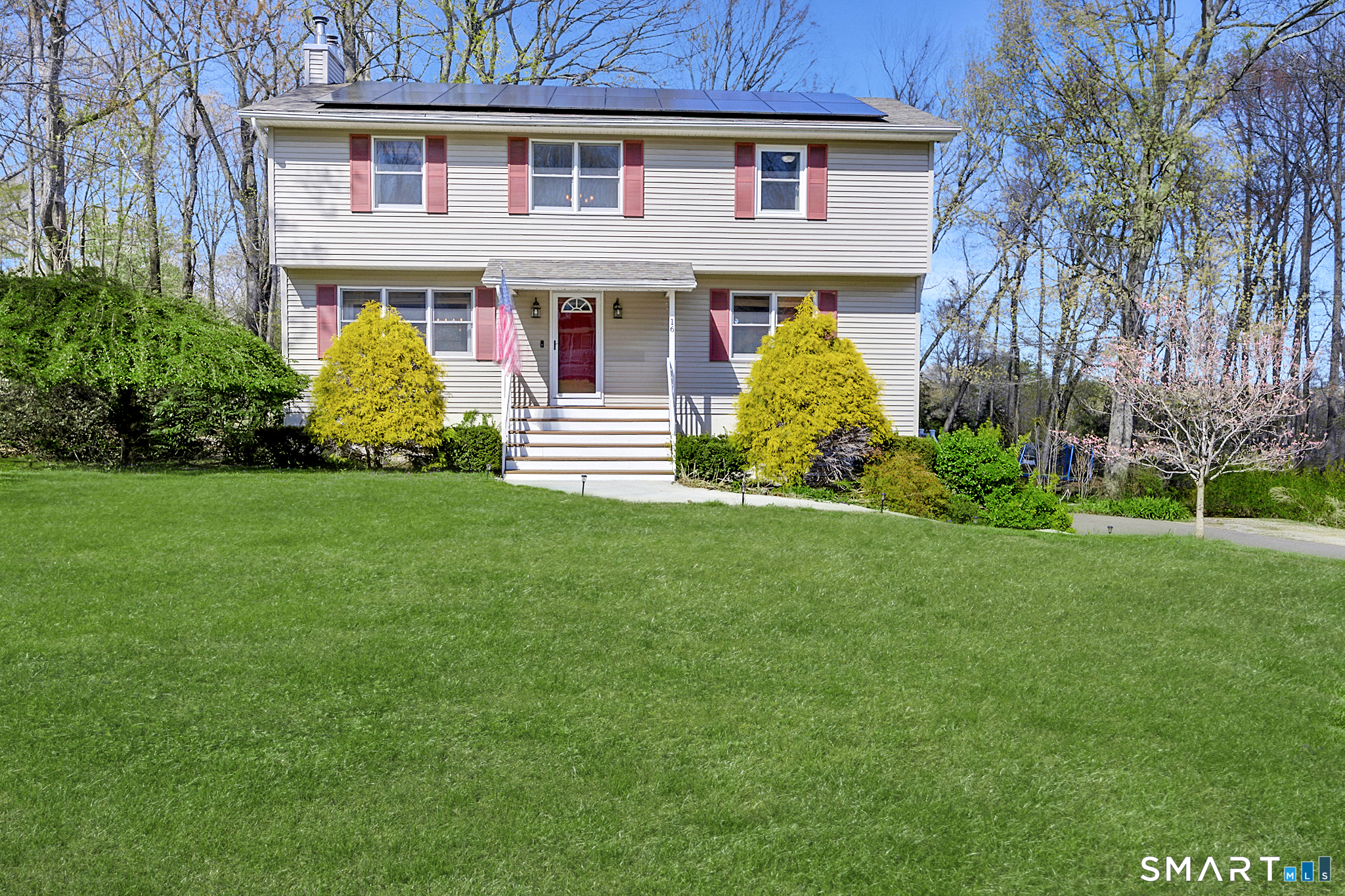 16 Stephen Court Prospect, CT 06712 - Photo 3 of 39 a front view of house with yard and green space