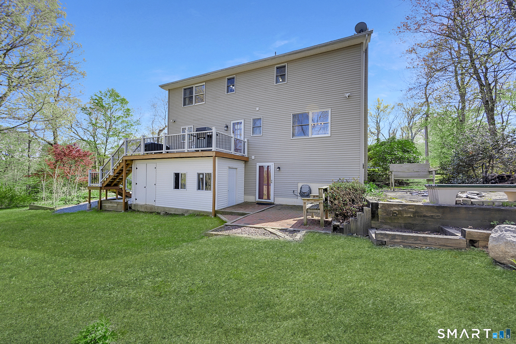 16 Stephen Court Prospect, CT 06712 - Photo 35 of 39 a front view of house with a garden and patio
