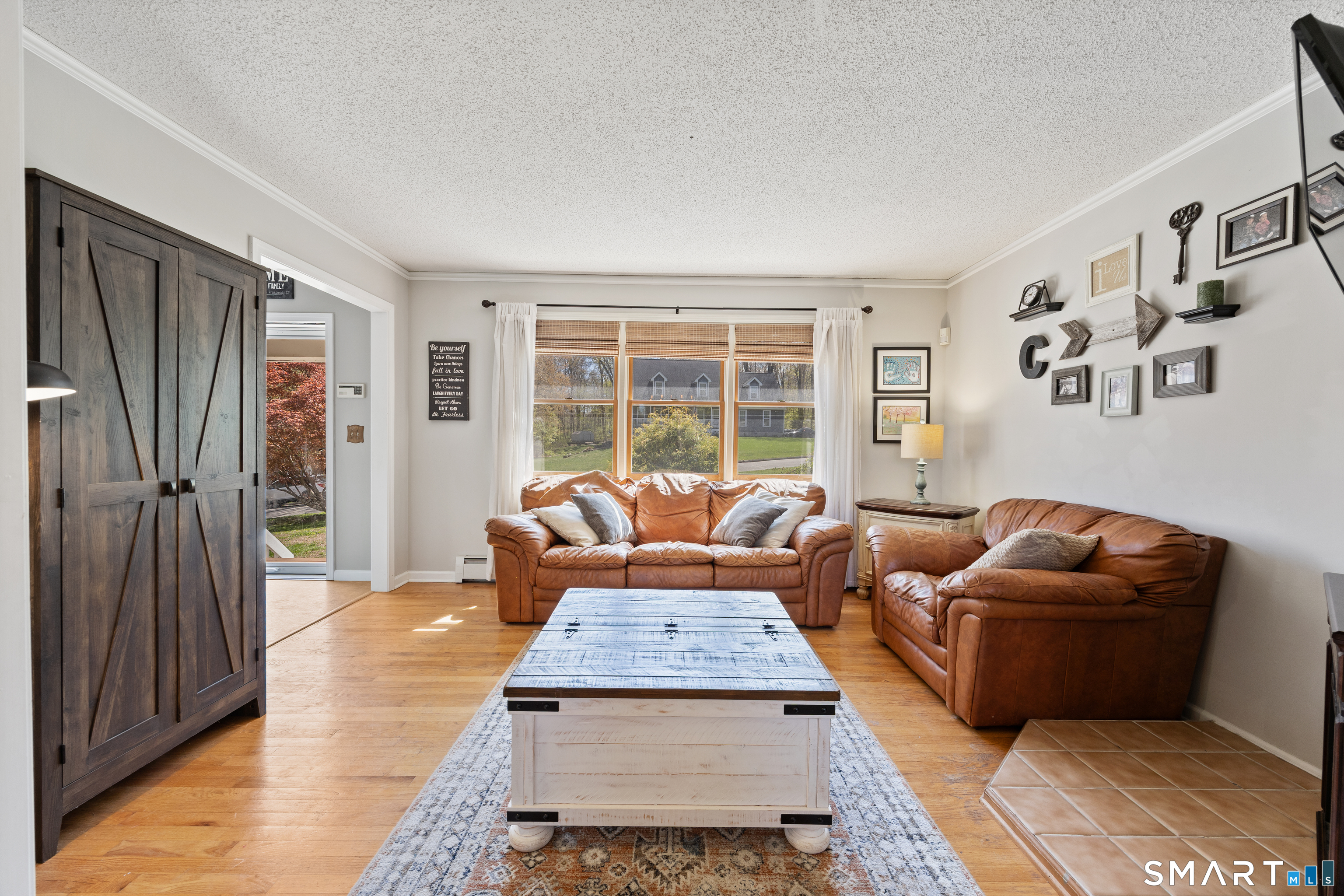 16 Stephen Court Prospect, CT 06712 - Photo 7 of 39 a living room with furniture and a window