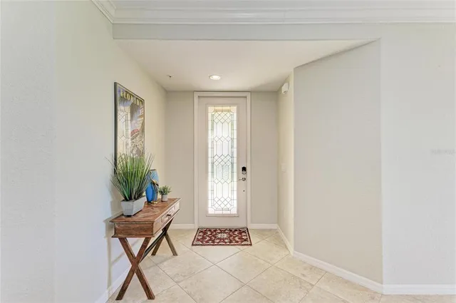 a dining room with furniture and windows