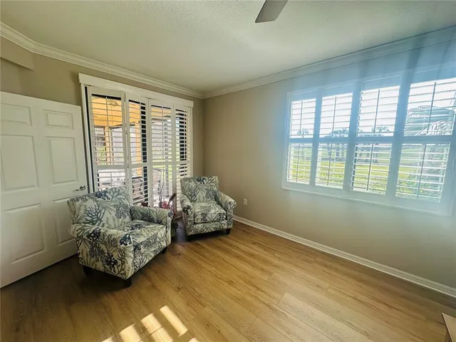 a room with furniture and a window